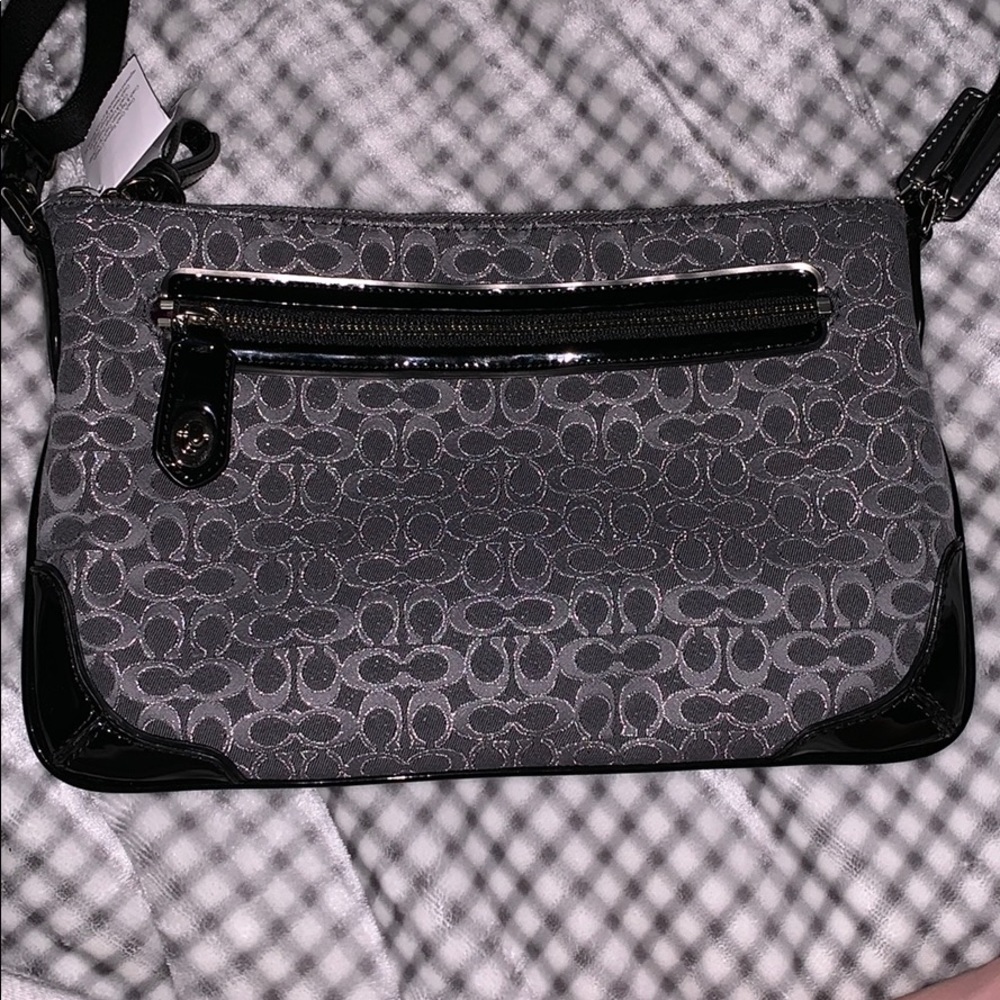 Coach charcoal shoulder bag.